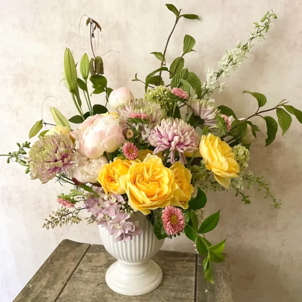 Beyond Love arrangement a mix of Dahlias, Roses, Greenery, Lilies, and Hydrangeas flower delivery dubai