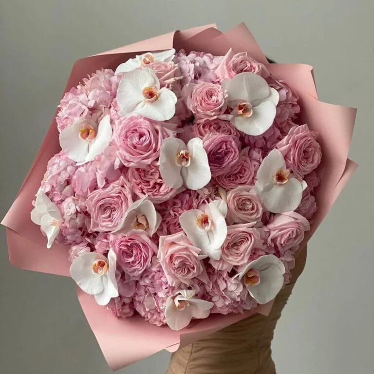 About Us pink roses and orchids