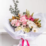 Timeless Grace Bouquet with pink roses, white orchids, and hydrangeas in a Dubai luxury floral arrangement