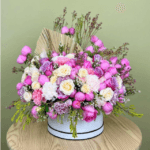 Blushing Blooms Hatbox Arrangement