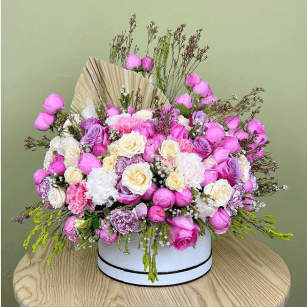 Blushing Blooms Hatbox Arrangement