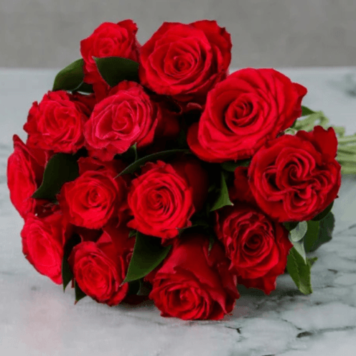 A classic bouquet of 15 velvety red rose perfection, symbolizing love and passion, available for flower delivery in Dubai