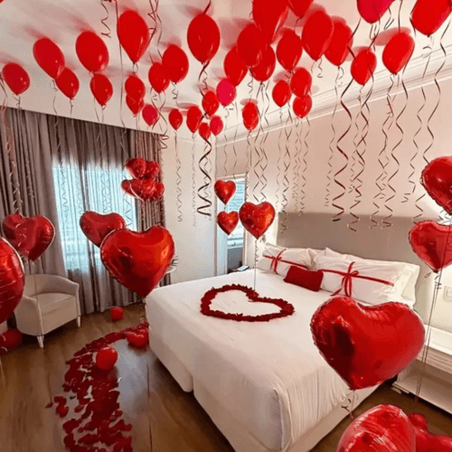 Eternal Love Bliss Dubai - Romantic room decoration with 201 red roses, heart-shaped balloons, and rose petals perfect valentines day flowers and surprises