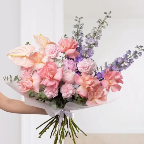 Luxury Wow Bouquet with pastel roses, eucalyptus, delphinium, and anthuriums – same-day flower delivery in Dubai