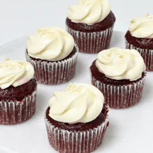 Fresh red velvet cupcakes with cream cheese frosting, decorated for Valentine’s Day – same-day delivery in Dubai.