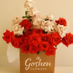 scarlet whisper is a luxury red and blush rose box bouquet by Goshen Flowers for romantic flower delivery in Dubai, UAE