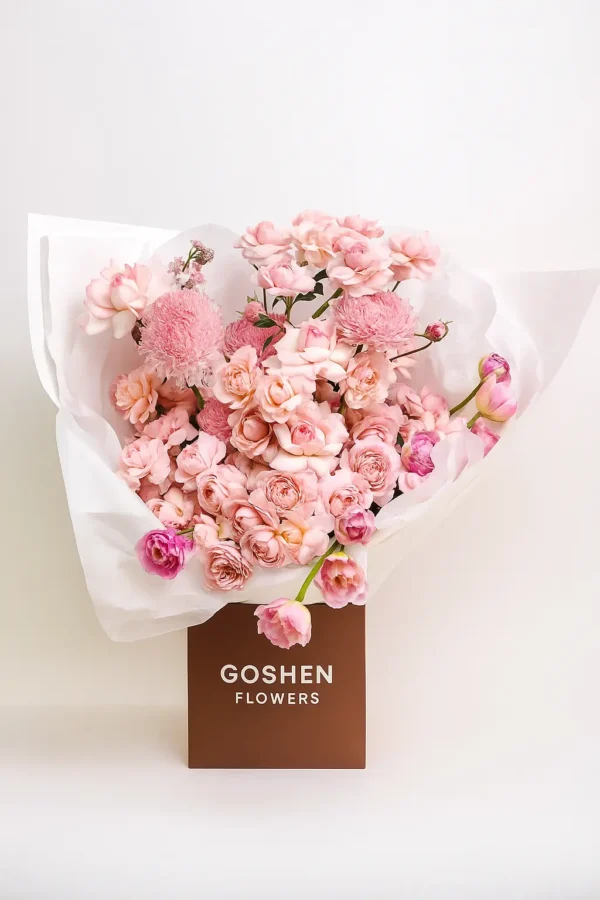 Blushing Bloomscape a blush pink flower bouquet with roses, spray blooms, and chrysanthemums in a luxury brown box – Goshen Flower Dubai.