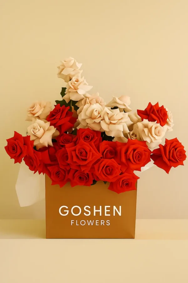Scarlet whisper is a luxury red and blush rose box bouquet by Goshen Flowers for romantic flower delivery in Dubai, UAE