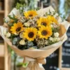 Golden Glow sunflower bouquet with daisies, baby’s breath, and eucalyptus – available for flower delivery in Dubai UAE